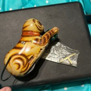 Antique window up cat toy with new in package wind up tool